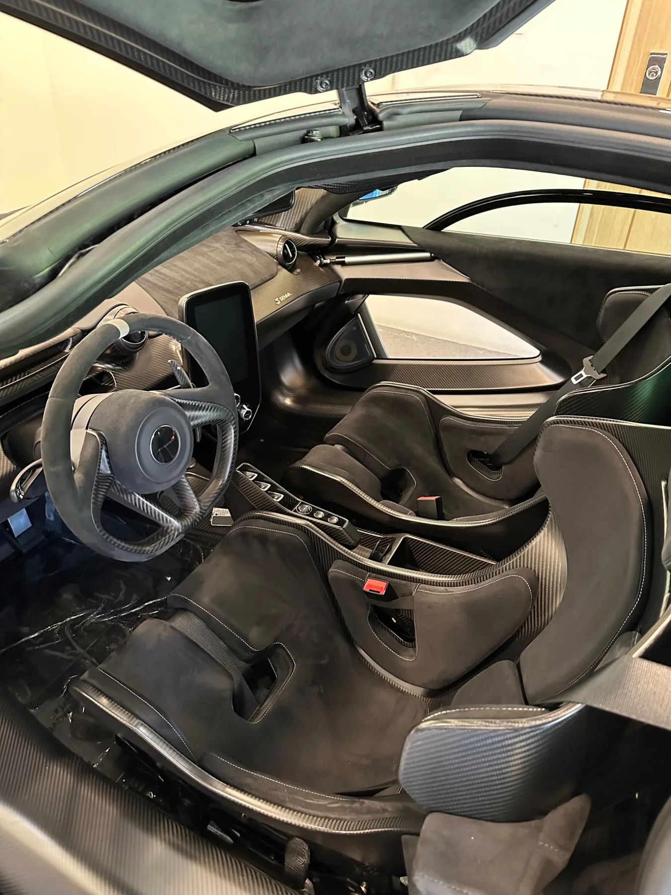 McLaren interior showing clean glass and cabin detail