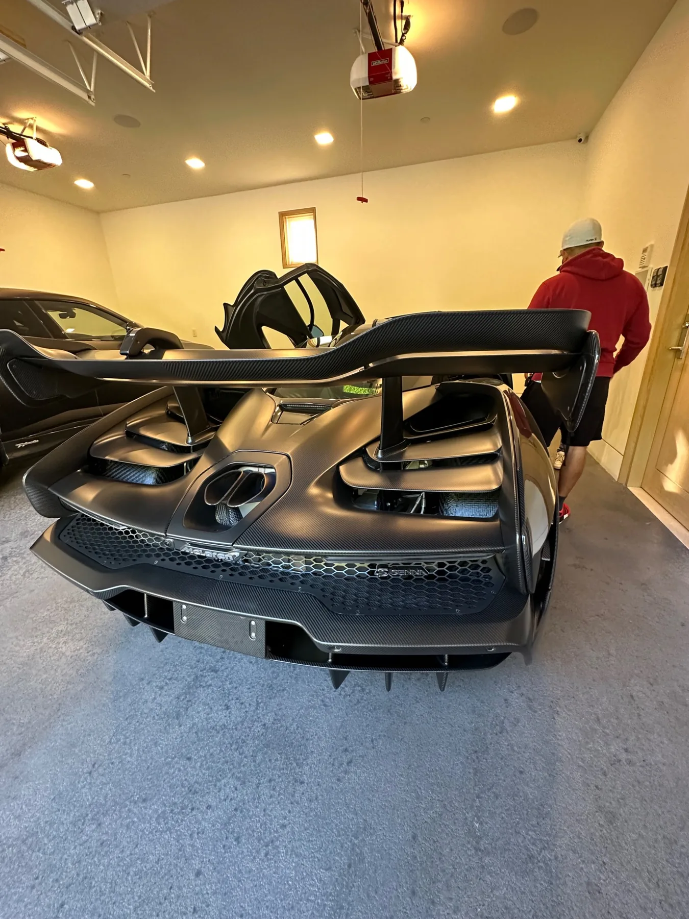 Close view of a McLaren rear section and window tint work area