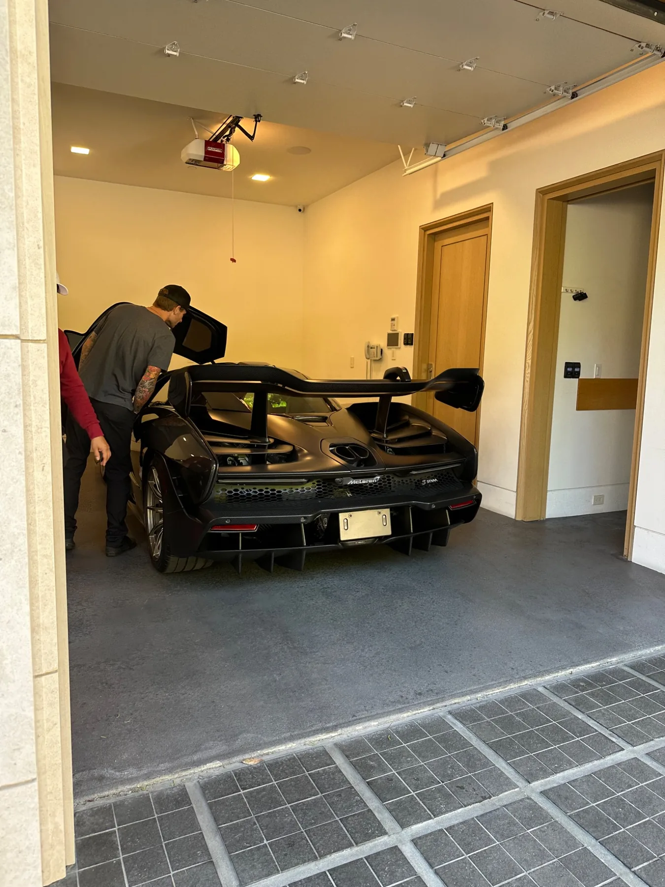 McLaren in a garage during window tint service